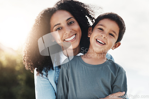 Image of Happy family hug, portrait and child and mother bonding, laughing or enjoy quality time together in nature park. Vacation face, love smile and outdoor people on relax holiday in Rio de Janeiro Brazil