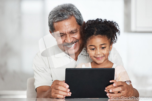 Image of Grandfather, learning and girl with tablet in home for streaming video, movie or social media. Bonding, touchscreen and care of happy grandpa with child watching film or web browsing on technology.