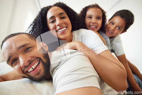 Image of Happy family, portrait and selfie with children and parents relax, play and having fun in their home together. Face, smile and African kids laugh with mother and father for photo while bonding