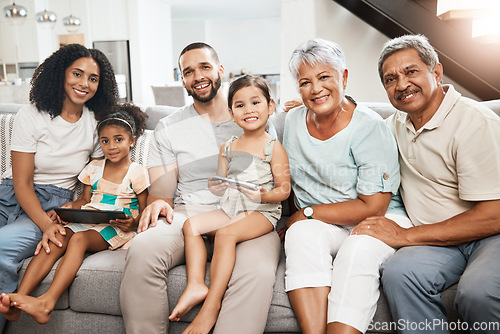 Image of Big family, portrait smile and on living room sofa relaxing together for fun holiday break or weekend at home. Happy grandparents, parents and children smiling in happiness for bonding time on couch