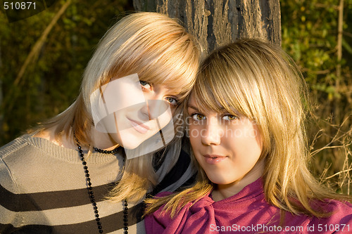Image of Portrait of the two young women outdoors