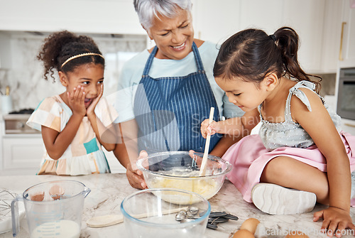 Image of Learning, grandmother and cooking girl in kitchen mixing baking dough in bowl in home. Education, family wow and surprised kid with grandma teaching children how to bake for child development