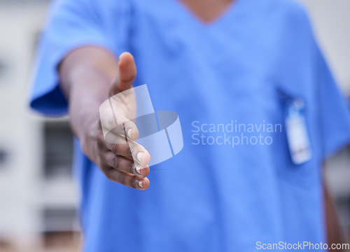 Image of Doctor, handshake or black woman medical worker greeting, welcome or shaking hands in hospital, office or clinic. Trust, partnership or nurse for support, help or onboarding team deal and thank you.