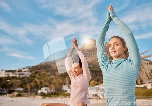 Image of Yoga, mockup and meditation friends on the beach together for mental health, wellness or inner peace in summer. Exercise, diversity or nature with a female yogi and friend meditating outside