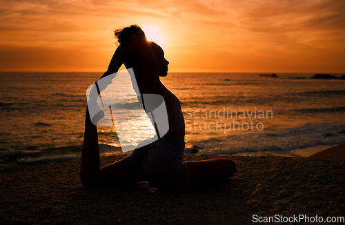 Image of Pilates, yoga and silhouette of woman at sunrise on beach for exercise, training and pilates workout. Motivation, meditation and shadow of girl balance by ocean for sports, wellness and stretching