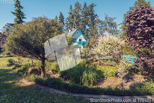 Image of Beautiful house in spring garden