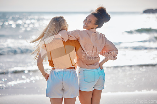 Image of Back view, hug or friends at a beach to relax talking or laughing on summer holiday vacation in Florida, USA. Bonding, happy or young women enjoy traveling to sea or ocean on girls trips with freedom