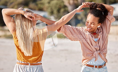 Image of Infinity, happy or friends at a beach holding hands relaxing or laughing on summer holiday vacation in Florida. Bonding, smile or women enjoy traveling to sea or ocean on girls trips with freedom