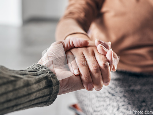 Image of Mental health, holding hands and support with counseling or prayer, therapy group and worship with people in crisis. Psychology, empathy and praying together, respect and community with trauma