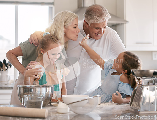 Image of Happy family, baking and children helping grandparents in home kitchen with food. Woman, man and girl kids learning to make cookies, pancakes or cake for breakfast with love, care and teamwork