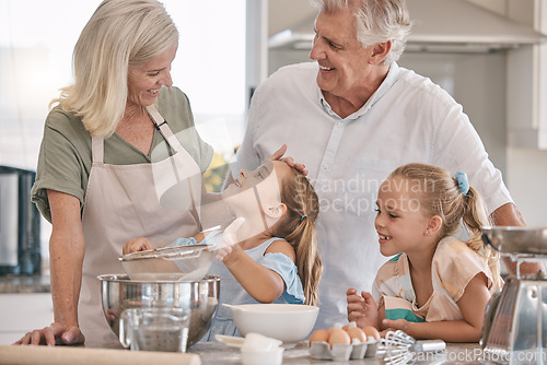 Image of Baking, love and senior family with children in kitchen care, bond and learning for morning breakfast help. Real people or grandparents and girl kids teaching, cooking and food with child development