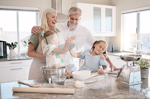 Image of Family, baking and high five with children helping grandparents in home kitchen. Woman, man and girl kids learning to make cookies, pancakes or cake using flour with love, care and teamwork for food