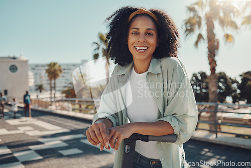 Image of Portrait, scooter travel and black woman in city with eco friendly transportation outdoors. Technology, transport sustainability and happy female from South Africa with electric moped in street.