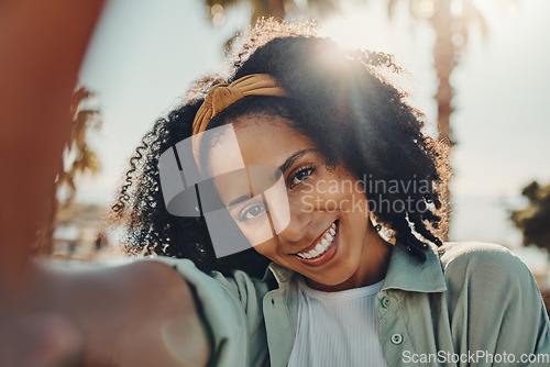 Image of Portrait, selfie smile and happy black woman taking pictures to remember memory, social media or profile picture. Face, beauty and female from South Africa talking photo outdoors in nature or park.