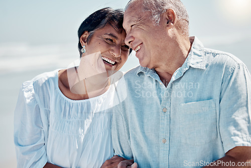 Image of Senior couple, ocean and smile for love, relax and travel on summer holiday, vacation and date. Happy retirement, man and woman at beach for happiness, support and trust in care together in sunshine
