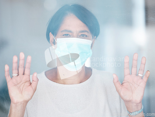 Image of Old woman, face mask and Covid with health and safety, sad portrait with hands on window and isolation. Retirement, lockdown and compliance with law, healthcare rules and hygiene to stay healthy