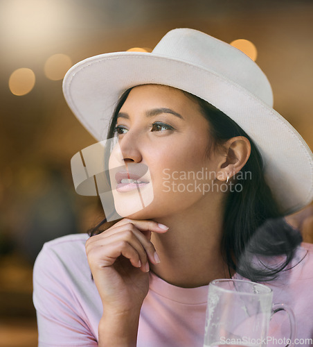 Image of Thinking, woman and restaurant of a young person with a beer glass with bokeh light. Beautiful, contemplating and female with a memory and idea at a coffee shop contemplating travel in a cafe