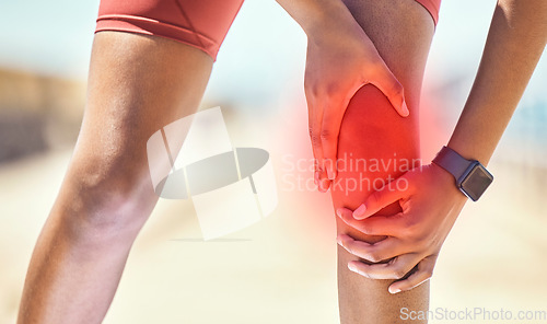 Image of Knee pain, hands and black woman runner by the sea with fitness, training and running injury. Leg massage, hand zoom and athlete with joint, muscle and inflammation problem with blurred background