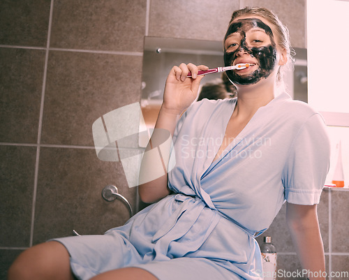 Image of Brushing teeth, face mask and portrait of a woman at night doing self care and wellness. Home facial, bathroom and dental hygiene of a young person doing skincare, dermatology and cleaning in house