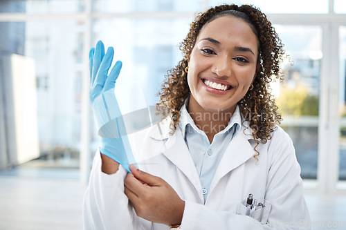 Image of Black woman, scientist and medical research, gloves and hand, smile in portrait with safety and health science. Healthcare, doctor and investigation, forensic analysis with test, experiment and PPE