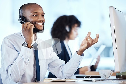 Image of Call center, black man and phone call of a crm, contact us and telemarketing employee. Businessman, web support and computer communication of an online consulting agent working on customer service