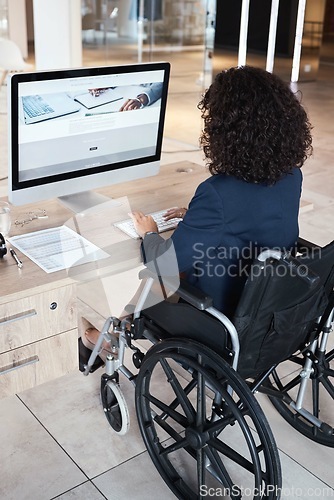 Image of Business woman, wheelchair and disability of a database administrator working on a computer. Office, disabled employee back and website data reading of a female typing a digital web strategy