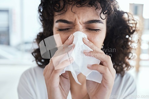 Image of Black woman, tissue and nose with flu in home with self care, health and sneeze by blurred background. Gen z girl, toilet paper and sick with allergy, covid and closeup in house, apartment or room