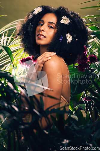 Image of Skincare, flowers and portrait of black woman in studio with a natural, organic and beauty face routine. Leaves, cosmetic and African female model with self care, health and wellness facial treatment