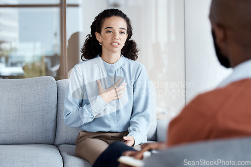 Image of Therapy, counselling and mental health conversation with woman patient and psychologist on couch. Person talking about psychology, anxiety and depression or stress with therapist for help or support