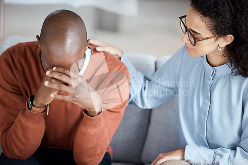 Image of Support, therapy and woman with black man, help with grief and depression in office. Mental health, female psychologist and African American male patient with sadness, anxiety and anxious with loss