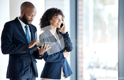 Image of Phone call, tablet and business people walking in the office together after a team meeting. Technology, career and man doing research on a digital device and woman on mobile conversation in workplace