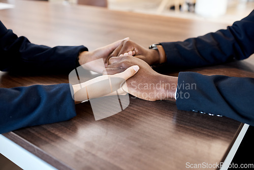 Image of Comfort, love and hands of couple in support of bad news, cancer or diagnosis at a table, unity and trust. Hand, holding empathy by woman with man for depression, prayer and kindness during crisis