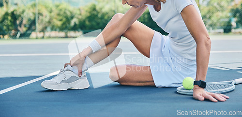 Image of Tennis, woman and ankle pain on court, fitness and sunshine for training, muscle strain and broken. Female athlete, player and lady with foot injury, inflammation and bruised bone outdoor or tension