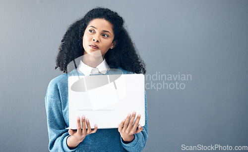 Image of Connection, ideas and woman holding a laptop for an email, internet and communication on office wall. Contact, proposal and business employee thinking of inspiration with a pc with mockup space