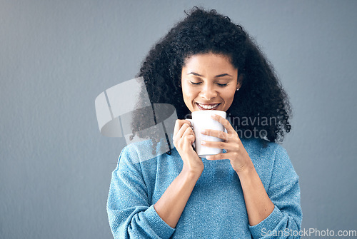 Image of Black woman, drink and coffee in studio, background and mockup backdrop. Happy young african female model smile with cup of tea, cappuccino and mug of latte for beverage break, happiness and mock up