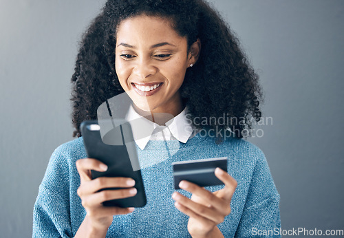 Image of Credit card, online shopping and woman with phone in studio for advertising on grey background. Ecommerce, banking and finance payment with app, transfer or savings on mockup or isolated copy space