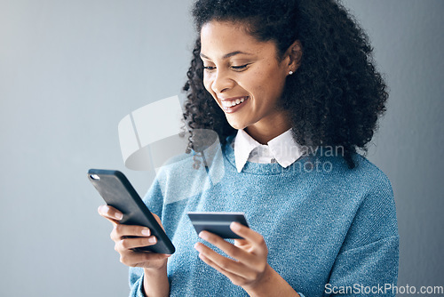 Image of Online shopping, credit card and woman with phone in studio for advertising on grey background. Ecommerce, banking and finance payment with app, transfer or savings on mockup or isolated copy space