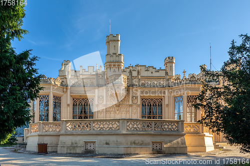 Image of Lednice Chateau with beautiful gardens and parks on sunny summer day