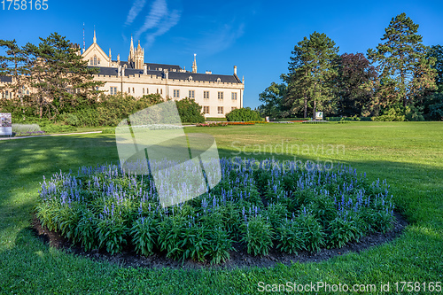 Image of Lednice Chateau with beautiful gardens and parks on sunny summer day