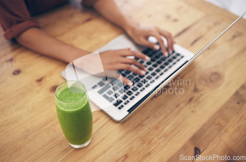 Image of Hands, laptop and nutritionist blog by woman typing, post or review on healthy living at home. Social media, health and influencer hand of girl writing online weight loss, wellness or smoothie recipe