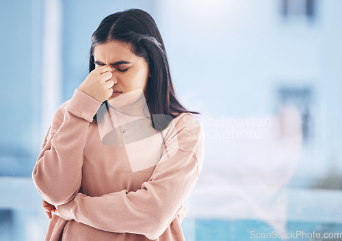 Image of Headache, stress or anxiety with an indian woman on a blurred background suffering from pain or burnout. Compliance, mental health or mistake and a frustrated young female struggling with a migraine