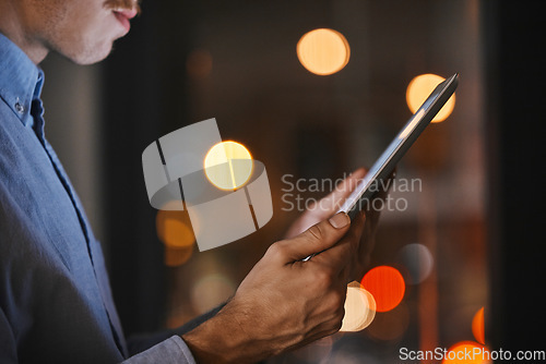 Image of Night, closeup and man with tablet, hands and social media for business, online reading and new project. Dark, male employee and leader with device, digital planning and search internet in workplace