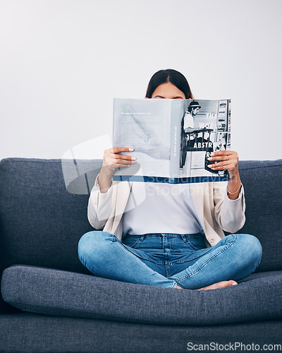 Image of Relax, magazine or woman reading newspaper articles on sofa at home for information or story updates. Press, focus or person relaxing and studying abstract art for knowledge in a publication on couch