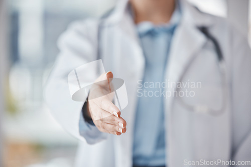 Image of Handshake, welcome and collaboration of doctor shaking hands teamwork deal, partnership or hiring. Trust, support or zoom of medical woman for thank you, B2B interview or healthcare help in hospital