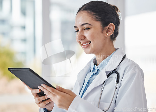 Image of Healthcare, research and doctor on tablet in hospital for medical report, test results and online consultation. Insurance, technology and woman health worker with digital tech for patient telehealth
