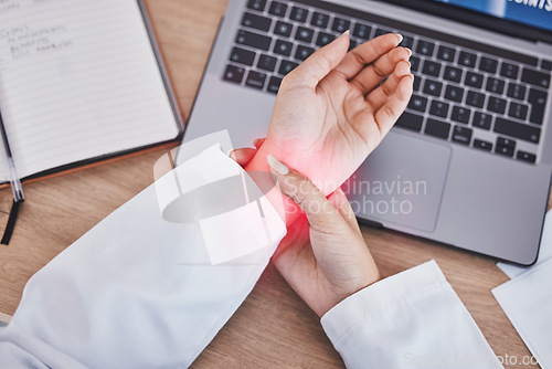 Image of Hands, woman and wrist with joint pain, laptop at desk from typing in office for public relations manager. PR expert, computer and burnout with red overlay for arthritis, carpal tunnel and planning