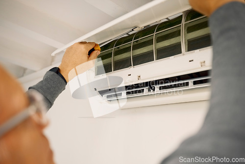 Image of Solar panels, construction and man doing installation of a grid for renewable energy and electricity. Building, house and handyman fitting a photovoltaic light into a room of a home for power