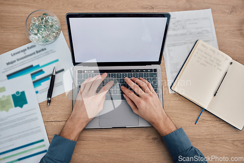 Image of Hands, laptop and green screen on mockup above for advertising, marketing or analytics at office desk. Hand of business person working on computer with mock up display for advertisement or online app