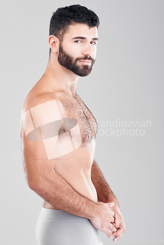 Image of Fitness, body and strong man portrait in underwear for exercise, weight loss and wellness. Aesthetic model for health, motivation and stomach or sexy muscle growth for healthy diet studio background
