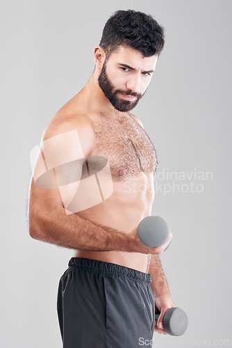 Image of Man, fitness and exercise with dumbbells in studio isolated on a gray background. Sports thinking, training and male bodybuilder with strong muscles weight lifting, workout or bodybuilding for power.